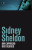 Capa do livro Um capricho dos deuses de Sidney Sheldon.